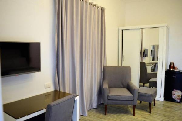 Chambre double avec vue sur le jardin